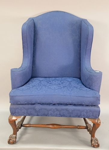 Kittinger Chippendale style mahogany wing chair with ball and claw feet and stretcher base, marked: Kittinger Furniture Co. Buffalo,...