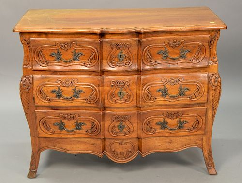 French style three drawer chest with carved front, with "made for Bloomingdales" tag. ht. 31in., wd. 39 1/2in.