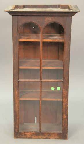Hanging cabinet with arched door. ht. 33in., wd. 17 1/2in.