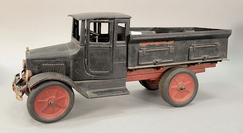 Buddy L Sand & Gravel truck, black and red pressed steel with Firestone tires. ht. 13in., lg. 16in.