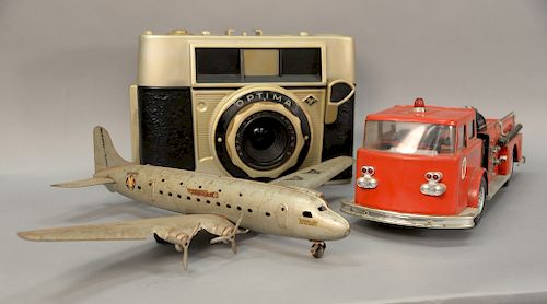 Three piece toy group including Buddy L Texaco Toy Fire Chief truck (lg. 25in.), Agfa Optima Compur advertising store display camera...