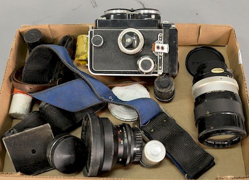 Rolleiflex camera plus two Nippon lenses.