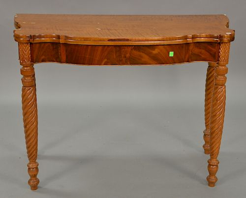 Victorian mahogany game table with shaped top. ht. 29in., top: 17 1/2" x 39 1/2"