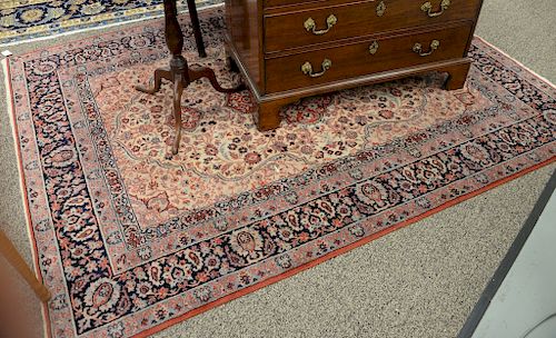 Oriental style area rug. 5'9" x 7'8"