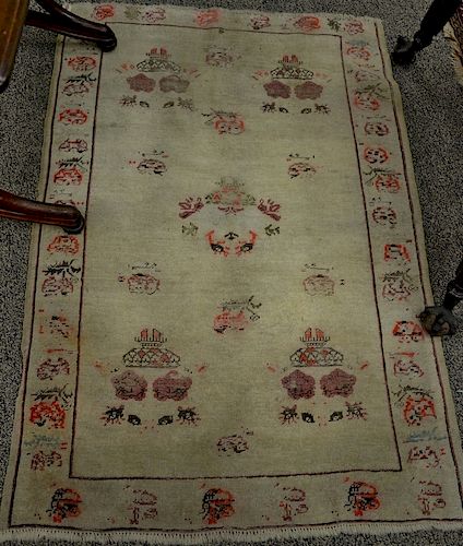 Oriental throw rug, probably 19th century (worn). 3'5" x 5'