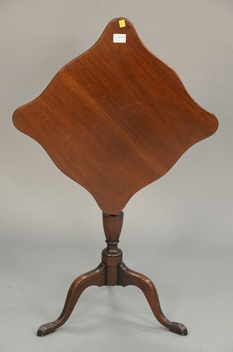 Colonial Williamsburg tip stand with shaped top. ht. 27 1/2in., top: 19 1/2" x 19 1/2"