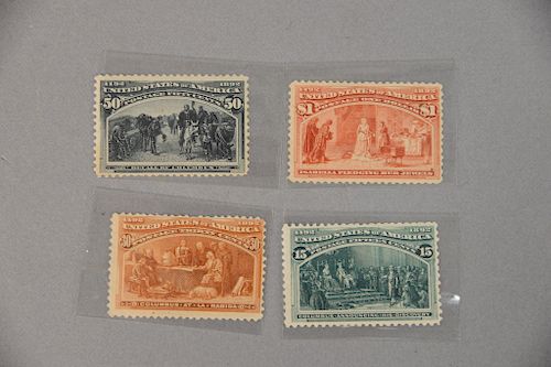 Four Columbus stamps, unused, including $1.00, 50 cent, 30 cent, and 15 cent.