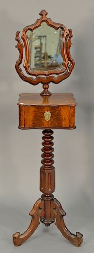 Empire mahogany shaving mirror over drawer shelf on turned pedestal base. ht. 61in., top: 15" x 15"