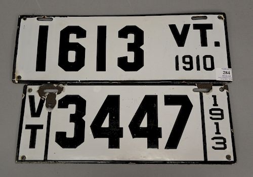 Two porcelain four digit Vermont license plates, one is dated 1910 (lg. 16 3/4in.) and the other 1913 (lg. 15 1/2in.).