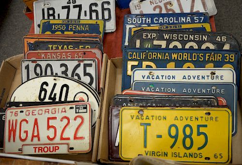 Two box lots of thirty-four vintage license plates from various states such as Texas, Oregon, Alaska, Nebraska, etc, between the yea...