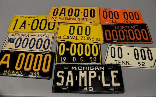 Ten vintage sample license plates to include a 1952 state shaped Tennessee license plate (lg. 13in.), 1950 Washington D.C., 1952