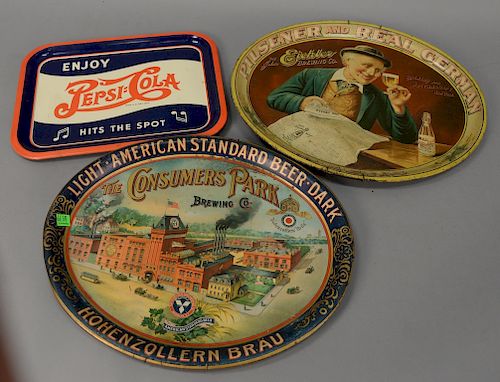 Three tin trays including two beer trays "The Consumer's Park Brewing Co." (13 3/4" x 16 1/2"), "Pilsener and Real German Eichler Br...