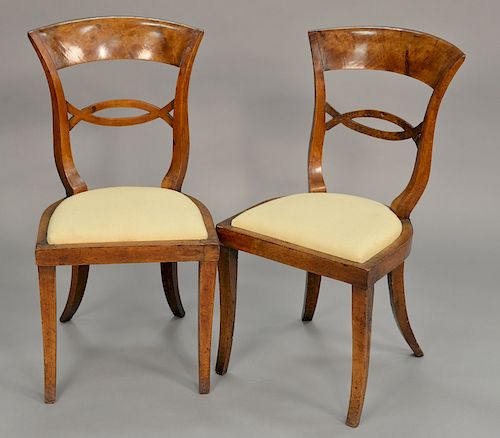 Set of twelve Continental side chairs with slip seats, early 19th century.