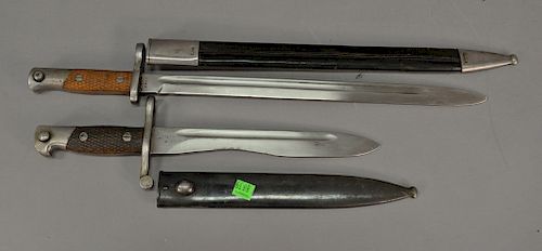 Two bayonets, one marked Artillerie Fabrica, the other with a crown. lg. 15 1/2in. & 22in.
