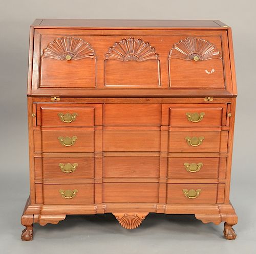 Mahogany Chippendale style block front desk with shell carved slant front. ht. 44in., wd. 42in.