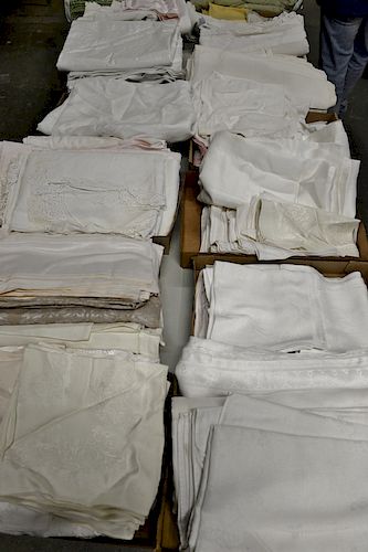 Table lot of linens to include napkins, tablecloths, table runners, etc.