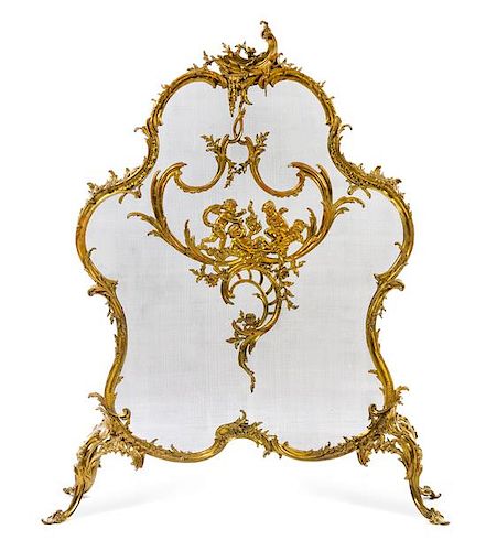 * A Louis XV Style Gilt Bronze Fire Screen Height 49 inches.