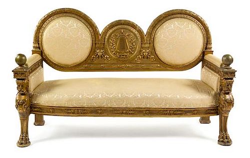 An Empire Style Giltwood Canape Height 48 3/4 x width 78 inches.