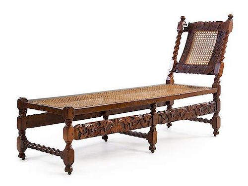 A William and Mary Oak Chaise Longue Height 35 1/2 x width 63 1/4 x depth 19 1/2 inches.