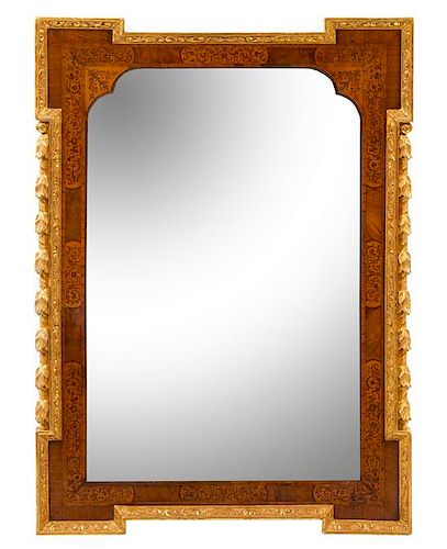 A Continental Parcel Gilt Marquetry Mirror Height 36 x width 26 inches.