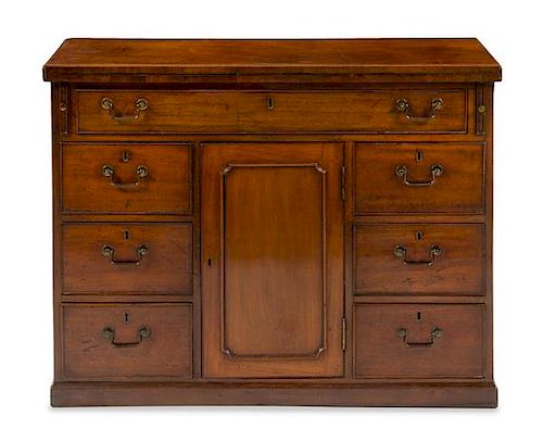 A Georgian Style Mahogany Bachelor's Chest Height 31 x width 40 7/8 x depth 13 3/4 inches (closed).
