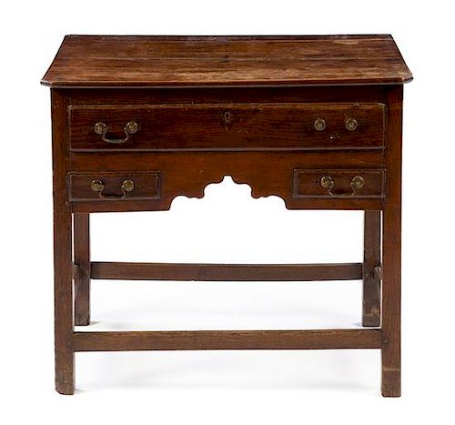 A George III Style Oak Table Height 29 3/8 x width 33 1/2 x depth 22 3/4 inches.