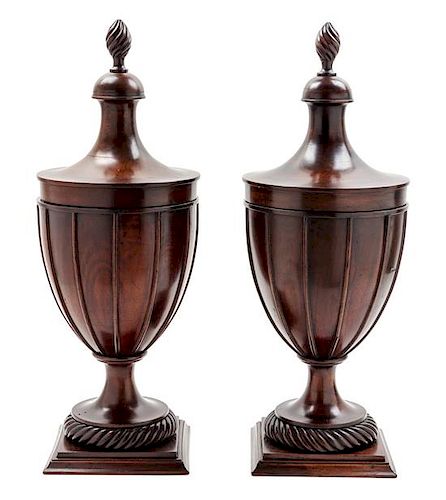 * A Pair of Regency Style Mahogany Cutlery Urns Height 28 1/2 inches.