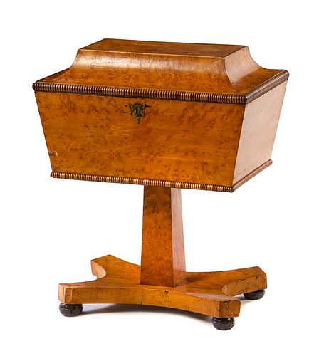 A Regency Style Maple Tea Poy Height 26 x width 21 1/4 x depth 14 1/2 inches.