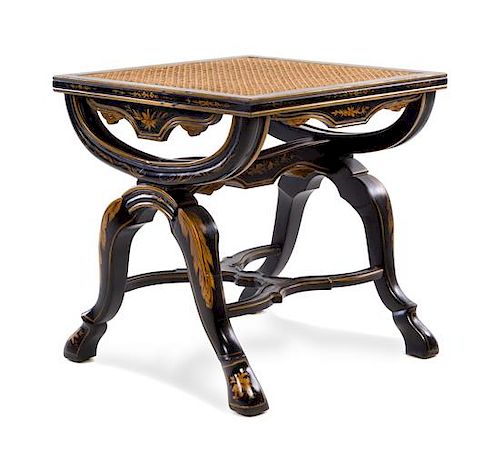 A Regency Style Ebonized and Parcel Gilt Stool Height 18 x width 17 1/4 x depth 17 1/4 inches.