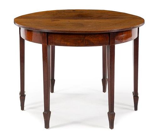 An English Convertible Center Table Height 30 x diameter 41 inches.