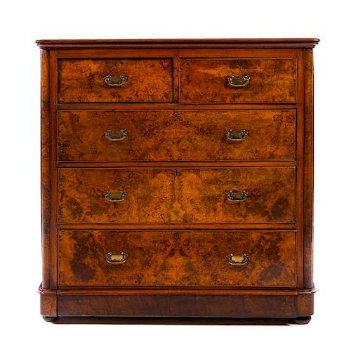 A Victorian Burlwood and Mahogany Chest of Drawers Height 46 1/2 x width 46 x depth 19 1/2 inches.