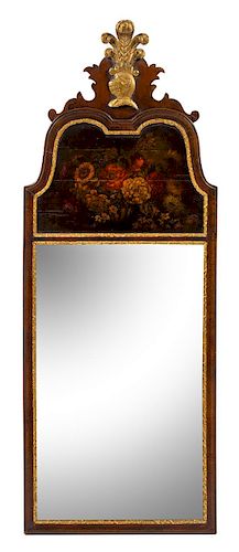 An English Painted and Parcel Gilt Mirror Height 52 x width 20 inches.