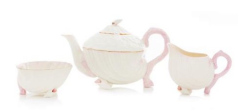 * A Belleek Neptune Tea Service Width of teapot 10 inches.