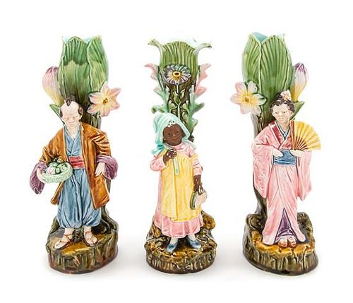 * Three Majolica Figural Spill Vases Height of each 11 1/2 inches.