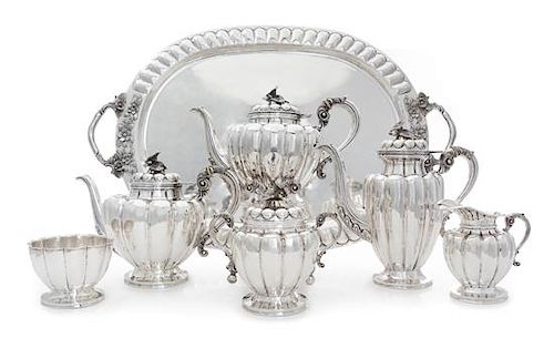 A Mexican Silver Tea and Coffee Service, Sanborns, Mexico City, 20th Century, comprising a water kettle on stand, coffee pot, te