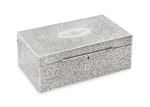 An American Silver Table Casket, Tiffany & Co., New York, NY, Early 20th Century, the hinged rectangular case worked to show all
