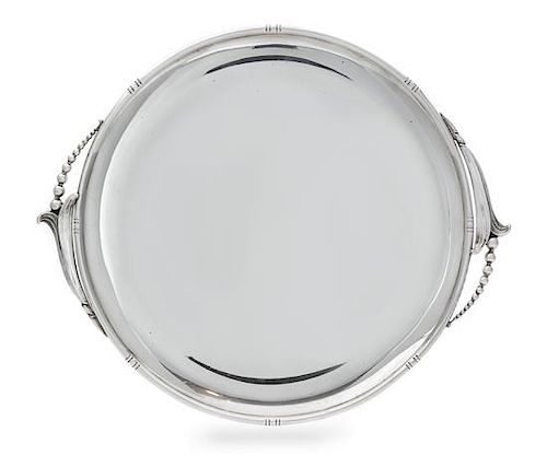 An American Silver Serving Tray, Woodside Sterling Co., New York, NY, Early 20th Century, of circular form with blossom form han