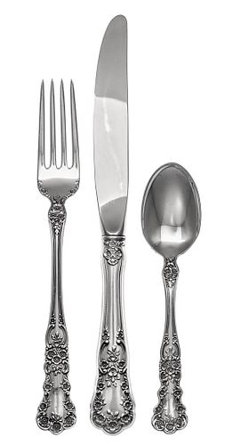 An American Silver Flatware Service, Gorham Mfg. Co., Providence, RI, Blossom pattern, comprising: 12 dinner knives 12 dinner kn