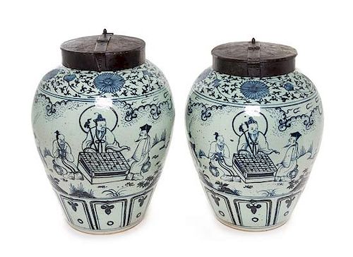 A Pair of Chinese Blue and White Porcelain Tea Jars Height 23 1/2 inches.