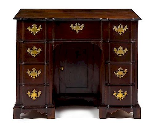 A Chippendale Mahogany Kneehole Desk Height 31 3/4 x width 40 x depth 21 1/2 inches.