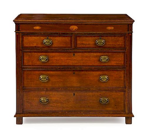 An American Oak and Marquetry Chest of Drawers Height 38 1/4 x width 43 1/4 x depth 20 1/2 inches.