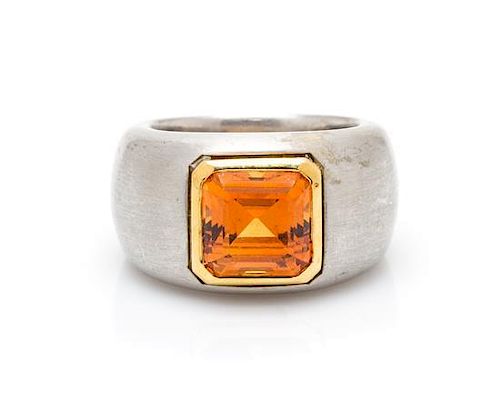 A Platinum, Yellow Gold and Fire Opal Ring, 18.80 dwts.