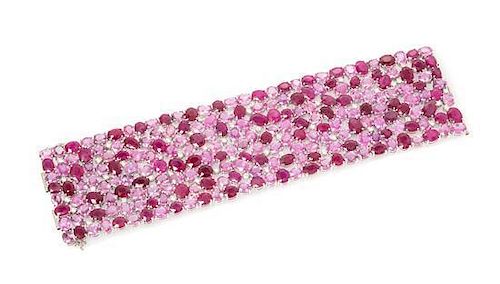 An 18 Karat White Gold, Ruby, Pink Sapphire and Diamond Bracelet, Michael Youssoufian, 77.90 dwts.