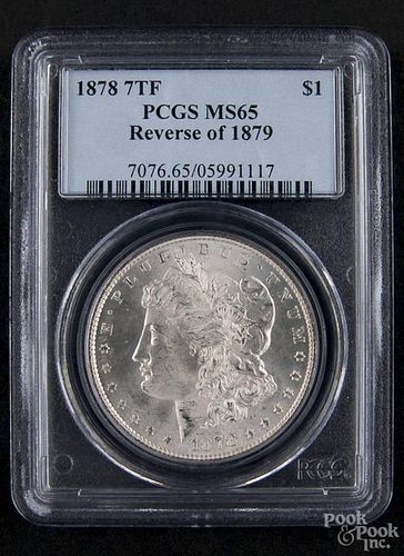 Silver Morgan dollar coin, 1878 7 TF, reverse of 1879, PCGS MS-65.