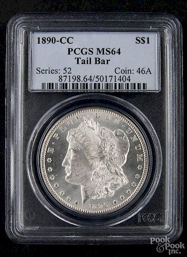 Silver Morgan dollar coin, 1890 CC, tail bar, PCGS MS-64.