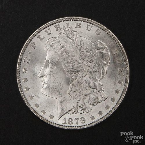 Silver Morgan dollar coin, 1879, MS-62 to MS-63.