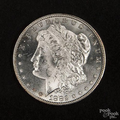 Silver Morgan dollar coin, 1882 S, MS-64 to MS-65.