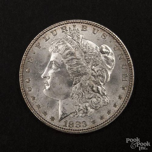 Silver Morgan dollar coin, 1883, MS-63 to MS-64.