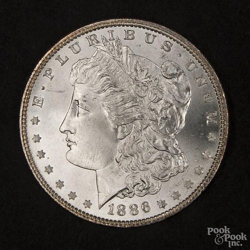 Silver Morgan dollar coin, 1886, MS-64 to MS-65.