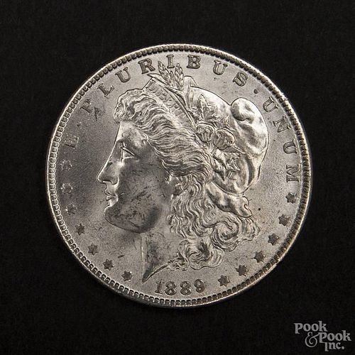 Silver Morgan dollar coin, 1889, MS-63 to MS-64.